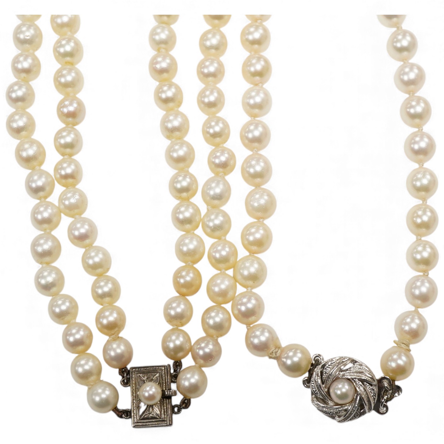 A Mikimoto double strand cultured pearl choker necklace, with cultured pearl set white metal clasp, 38cm, together with a single strand cultured pearl necklace, with cultured pearl set white metal clasp engraved 'silver'